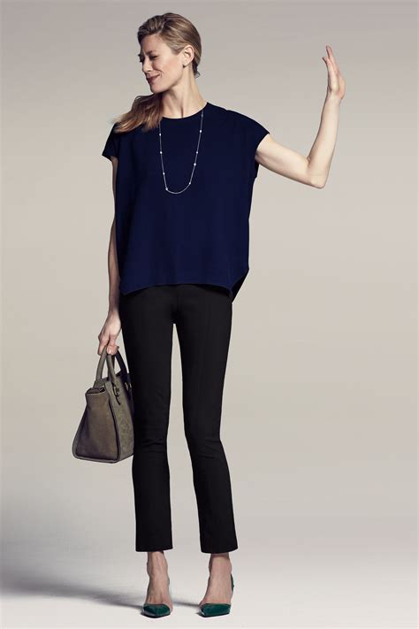 navy top with black pants.